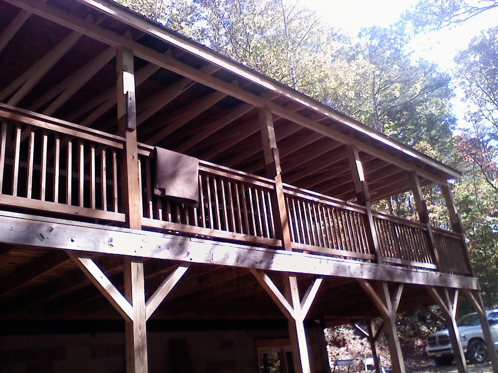 Timber framing under a new elevated porch and deck — Roof Leak Repair in Orfordville by Roofing Brothers